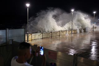 Super Typhoon Ragasa live: World’s strongest storm kills 14 in Taiwan as Hong Kong braces for impact A resident takes photos of rough waves from the shore before Super Typhoon Ragasa makes its closest
